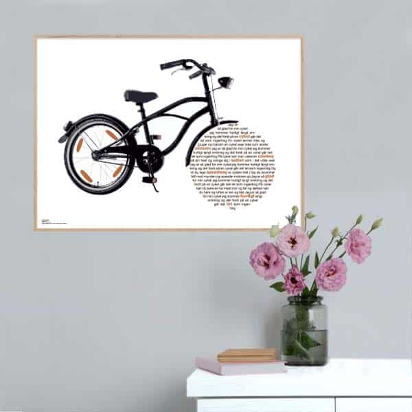 Plakat med sangteksten “Cykelsangen (Jeg er så glad for min cykel)" af Povl Kjøller.