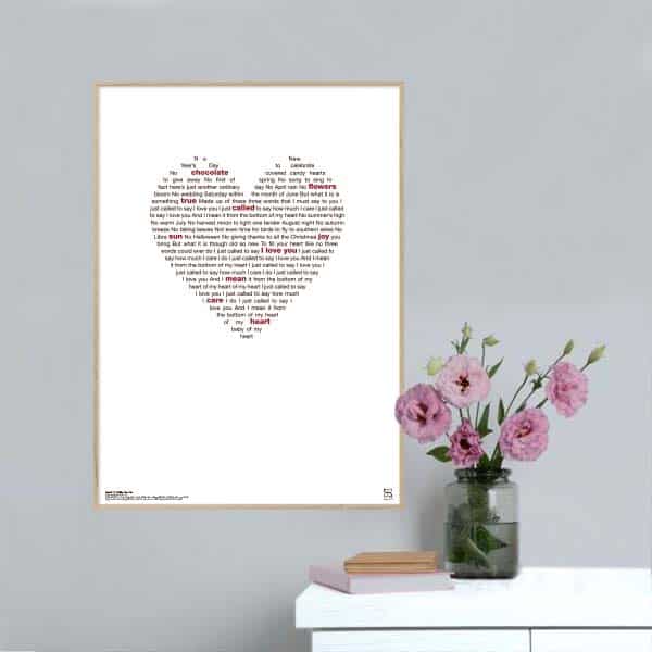 Flot plakat med Stevie Wonder's 'I Just Called To Say I Love You' opsat i grafisk form.